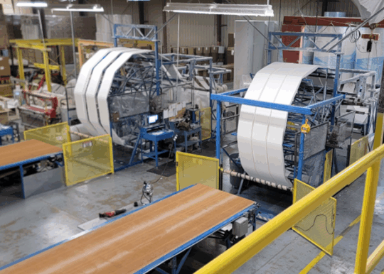 Image of a rewind machine in a factory