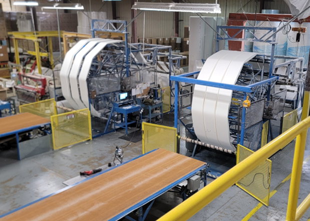 Image of a rewind machine in a factory