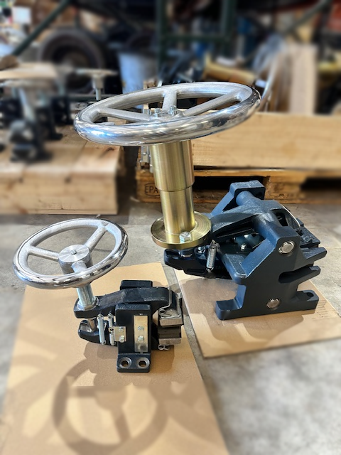 The smaller brakes (pictured left) are capable of 450 Nm of braking torque on a 400 mm diameter disc. The larger brakes (pictured right) are capable of 7,000 Nm of braking torque on a 610 mm diameter disc.